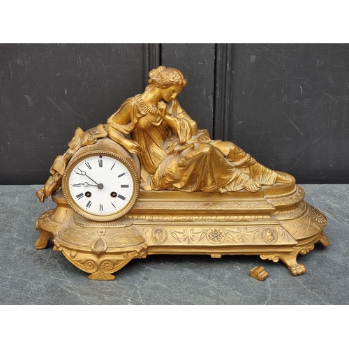 1111A - A late 19th century gilt spelter mantel clock, 47.5cm wide, lacking pendulum.