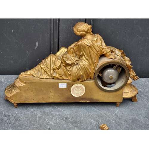 1111A - A late 19th century gilt spelter mantel clock, 47.5cm wide, lacking pendulum.