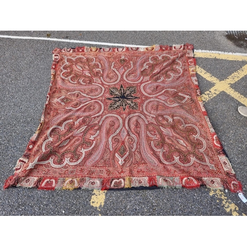 1141 - A large antique Kashmiri paisley shawl, 200 x 195cm.