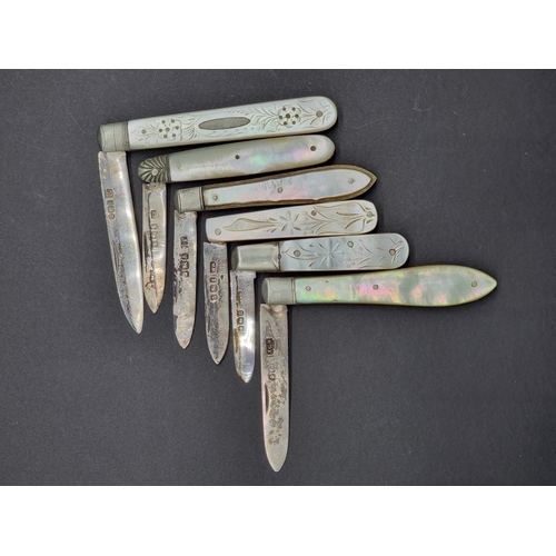 1684 - Six mother-of-pearl and silver folding fruit knives.