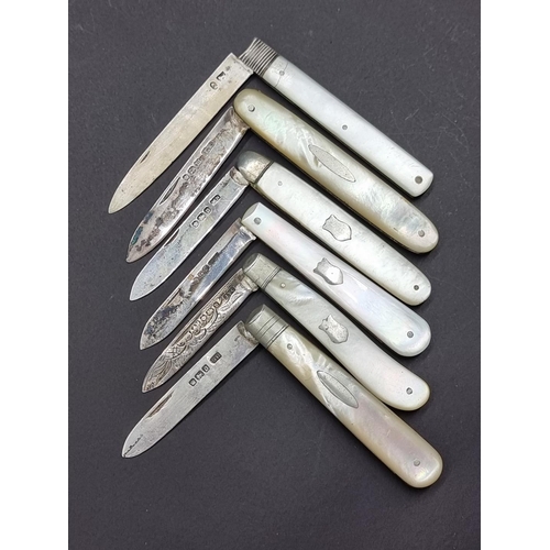 1685 - Six mother-of-pearl and silver folding fruit knives.