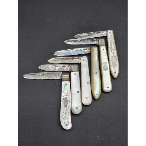 1690 - Six mother-of-pearl and silver folding fruit knives.