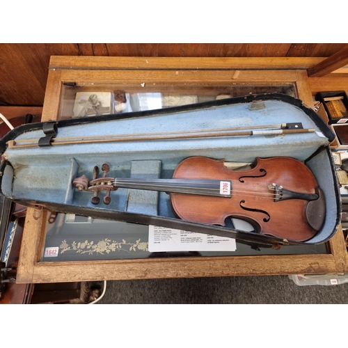 1706 - A good antique Continental violin, with 14in two piece back, with bow and case. ... 