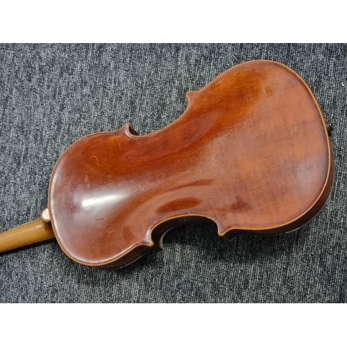 1708 - An antique Continental violin, labelled 'Medio-Fino', with 13in one piece back.  ... 