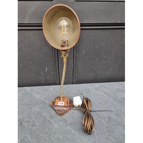 1720 - A vintage copper and brass articulated desk lamp. 