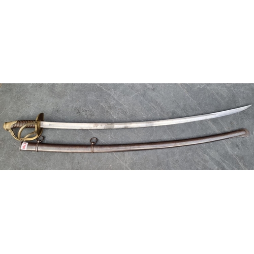 1786 - A 19th century French model 1822 light cavalry sabre and scabbard, with steel double fullered blade,... 