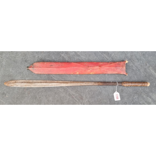 1789 - A West African Yoruba tribe Ida short sword, with 60cm double-edged blade, vellum grip and red stain... 