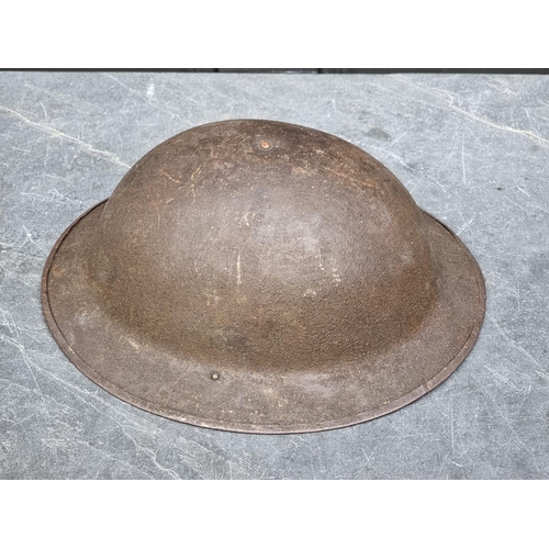 1809 - A WWI US American 33rd Infantry Division steel M17 helmet, with oil skin liner, stamped 'ZE57' to ri... 