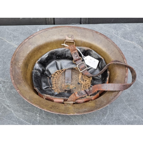 1809 - A WWI US American 33rd Infantry Division steel M17 helmet, with oil skin liner, stamped 'ZE57' to ri... 