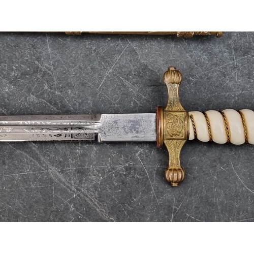 1815 - A WWII German Naval officer's dagger and sheath, by Puma Solingen, (tip of blade ground).... 