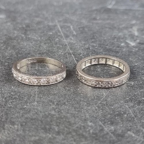 279 - An 18ct white gold diamond ten stone half eternity ring, size J1/2; together with another 18ct white... 