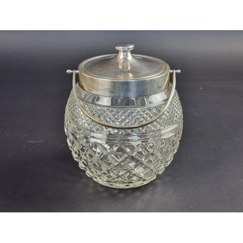 36A - A silver mounted cut glass biscuit barrel and cover, by J E Ltd, London 1925, 19cm high.... 