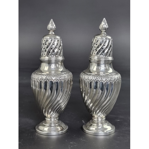 47 - A pair of silver sugar casters, by Josiah Williams & Co, London 1911, 17cm high, 238g.... 