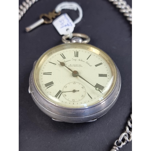 571 - An H Samuel silver key wind open face pocket watch, 55mm; together with a silver graduated curb link... 