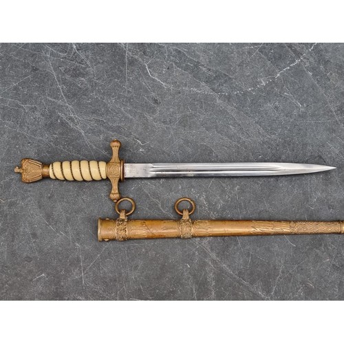 1796 - A WWII German Kriegsmarine officer's dagger and sheath, no makers mark, with 25cm blade.... 