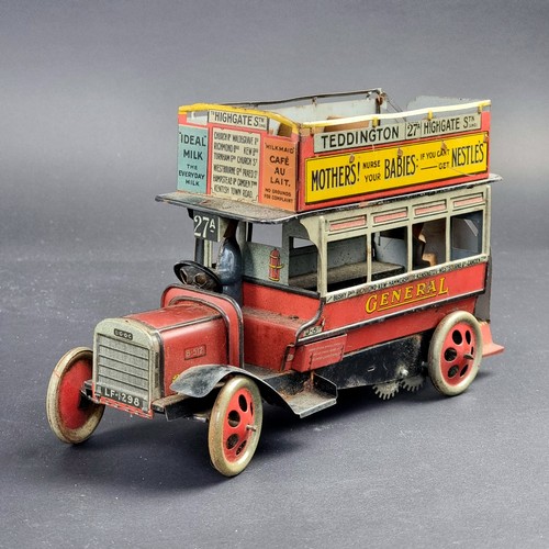 A rare circa 1920s Burnett clockwork tinplate B type 'General' Omnibus, 22.5cm long, (lacking one front mudguard, otherwise good).