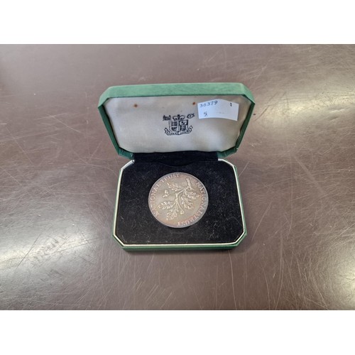 473A - A cased National Trust silver medal, to Avice Pickford, 25.3g.