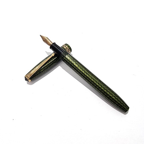 A 1950s Conway Stewart 74 green herringbone Grecian fountain pen, 14ct gold nib.