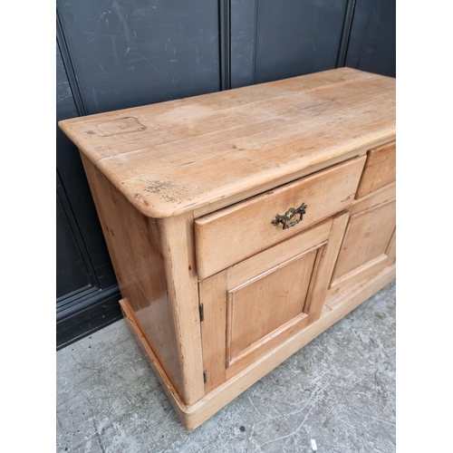 1004 - A Victorian pine side cabinet, 107cm wide.