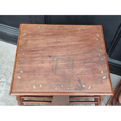 1005 - A pair of Eastern hardwood and brass inlaid occasional tables, 52cm wide.