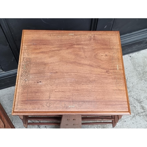 1005 - A pair of Eastern hardwood and brass inlaid occasional tables, 52cm wide.