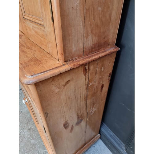 1017 - A Victorian pine secretaire cabinet, with white pottery knobs, 95cm wide.