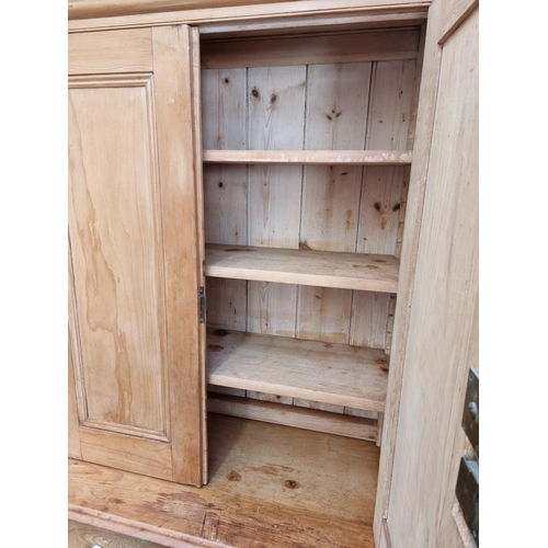 1017 - A Victorian pine secretaire cabinet, with white pottery knobs, 95cm wide.