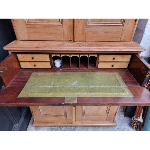 1017 - A Victorian pine secretaire cabinet, with white pottery knobs, 95cm wide.