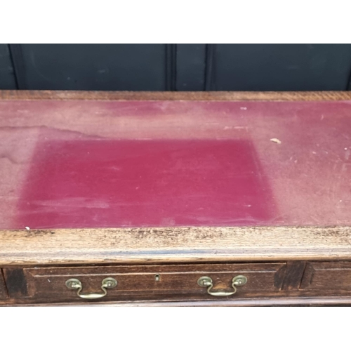 1019 - An old oak pedestal desk, 137cm wide.