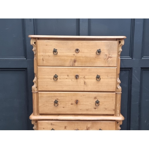 1022 - A pair of late 19th century Continental pine three drawer chests, 84.5cm wide, (one lacking feet). (... 