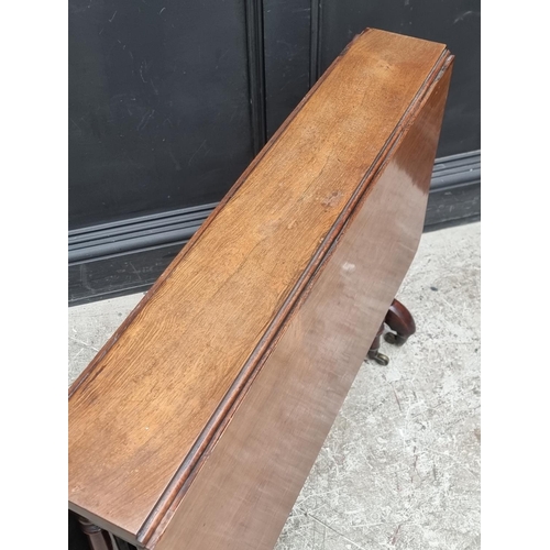 1026 - A Victorian rosewood Sutherland table, 90cm wide.