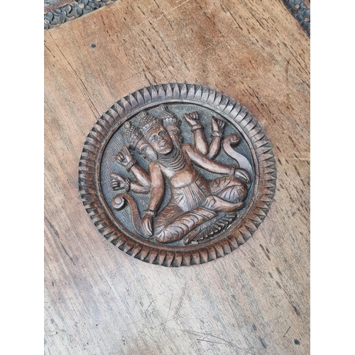 1031 - A late 19th century Anglo-Indian carved hardwood occasional table, 59cm wide.