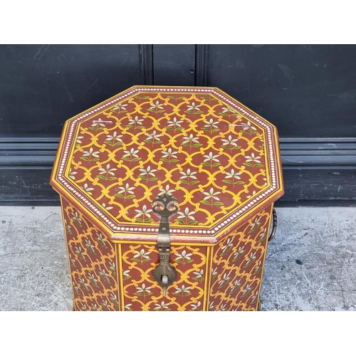 1034 - An Eastern polychrome painted hardwood octagonal chest, 42.5cm wide.