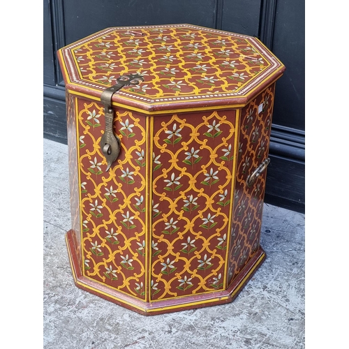 1034 - An Eastern polychrome painted hardwood octagonal chest, 42.5cm wide.