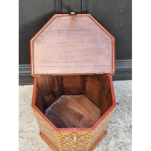 1034 - An Eastern polychrome painted hardwood octagonal chest, 42.5cm wide.