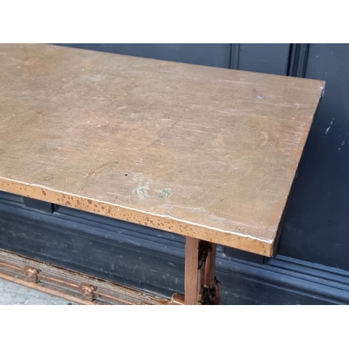 1037 - A pair of copper topped cast iron rectangular occasional tables, 99cm wide.