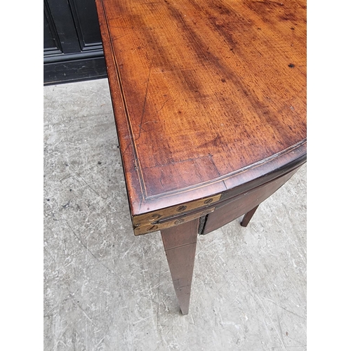 1039 - A George III mahogany and line inlaid demi-lune tea table, with double gateleg action, 95.5cm wide.... 