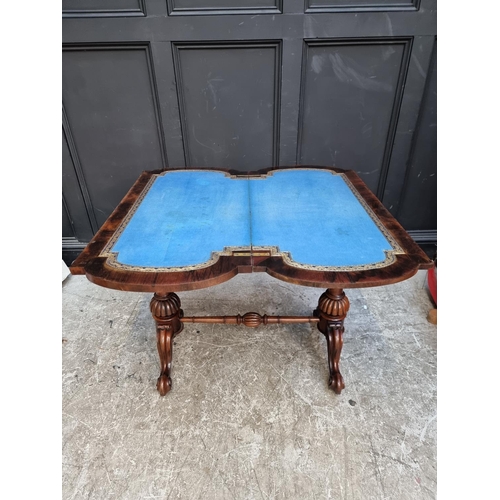 1045 - A Victorian rosewood and inlaid card table, 92cm wide.