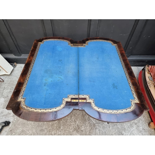 1045 - A Victorian rosewood and inlaid card table, 92cm wide.