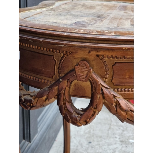 1050 - A Louis XV style giltwood writing table, 77cm wide, (lacking inset surface).