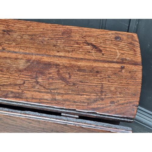 1058 - A late 17th century oak gateleg table, with lateral frieze drawer, 88cm wide.