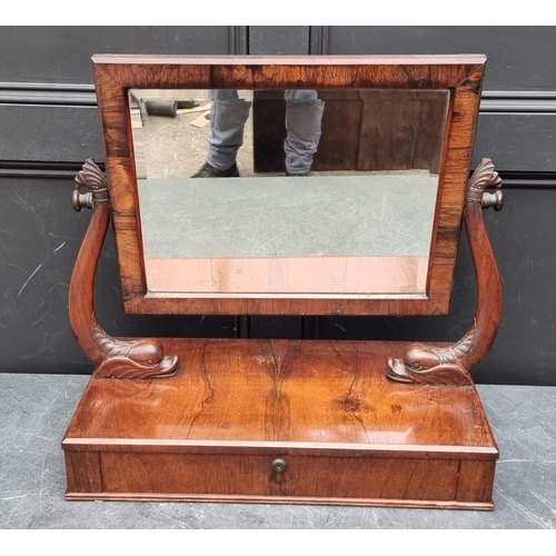 1059 - An unusual Victorian rosewood toilet mirror, with dolphin supports, 67cm wide.