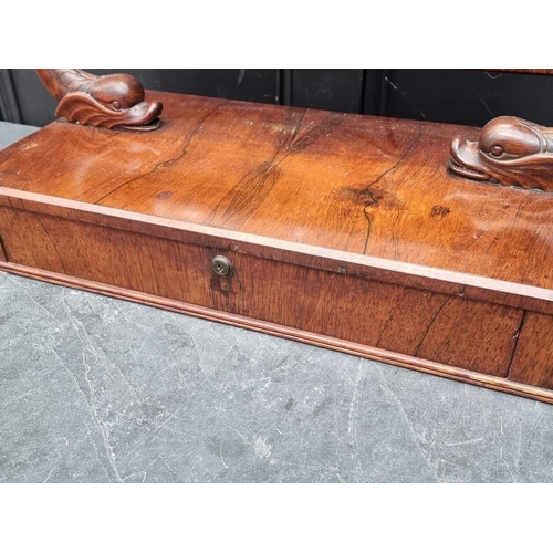 1059 - An unusual Victorian rosewood toilet mirror, with dolphin supports, 67cm wide.