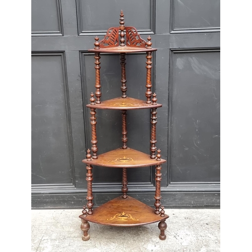 1061 - A Victorian walnut and inlaid corner whatnot, 144.5cm high.