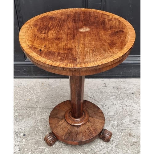 1062 - A Victorian rosewood and satinwood crossbanded circular tilt-top pedestal table, 58cm diameter.... 