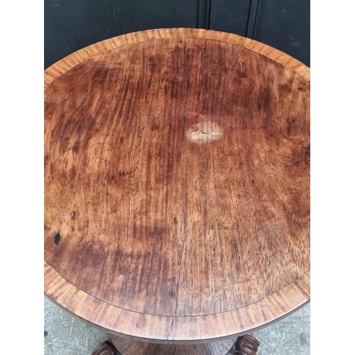 1062 - A Victorian rosewood and satinwood crossbanded circular tilt-top pedestal table, 58cm diameter.... 