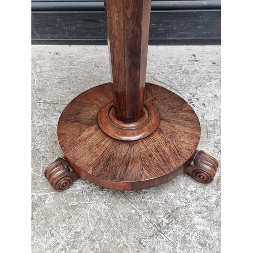 1062 - A Victorian rosewood and satinwood crossbanded circular tilt-top pedestal table, 58cm diameter.... 