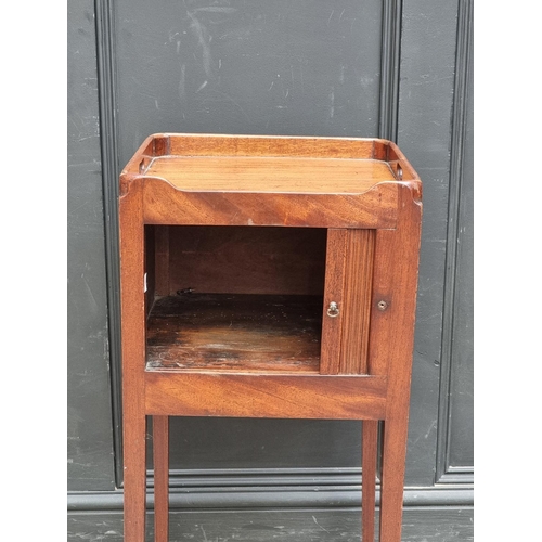 1065 - A George III mahogany tambour door pot cupboard, 39cm wide.