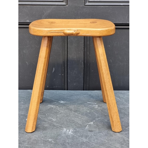 1072 - A Robert 'Mouseman' Thompson four legged cow stool, 37.5cm wide.