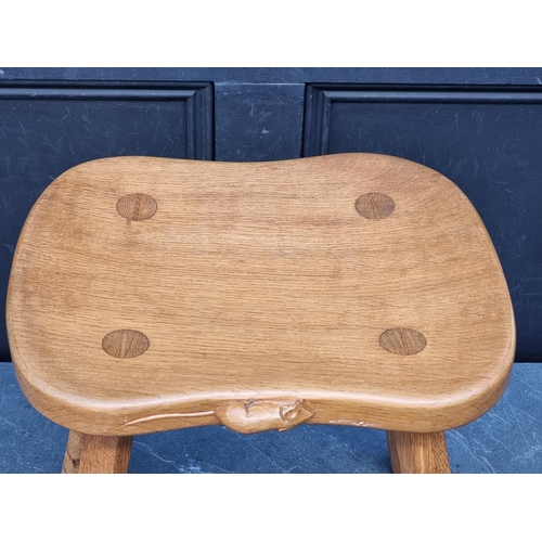 1072 - A Robert 'Mouseman' Thompson four legged cow stool, 37.5cm wide.